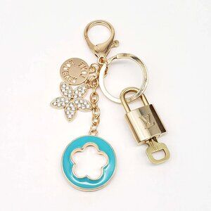 Authentic Louis Vuitton Lock & Key with unbranded Flower Bagcharm, Keycharm